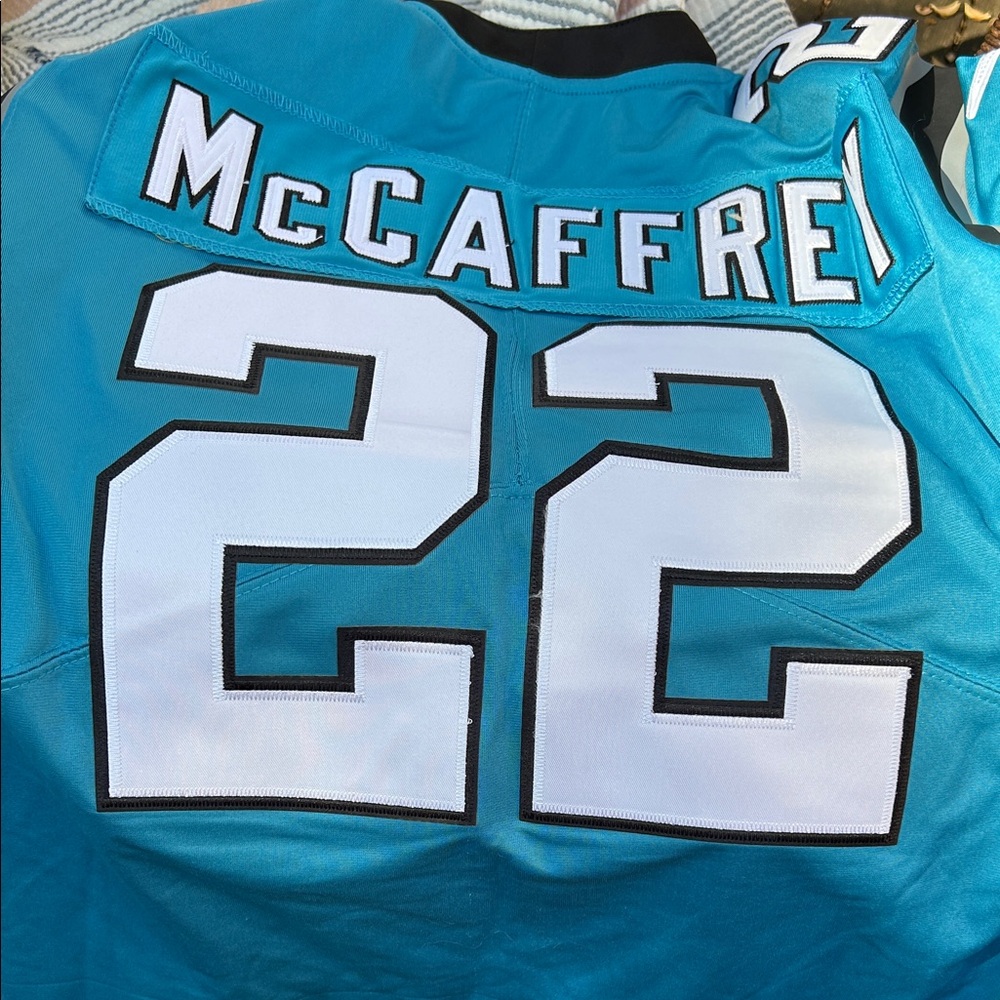 Carolina Panthers NFL Teal Onfield Jersey of Christian Macaffrey Number 22